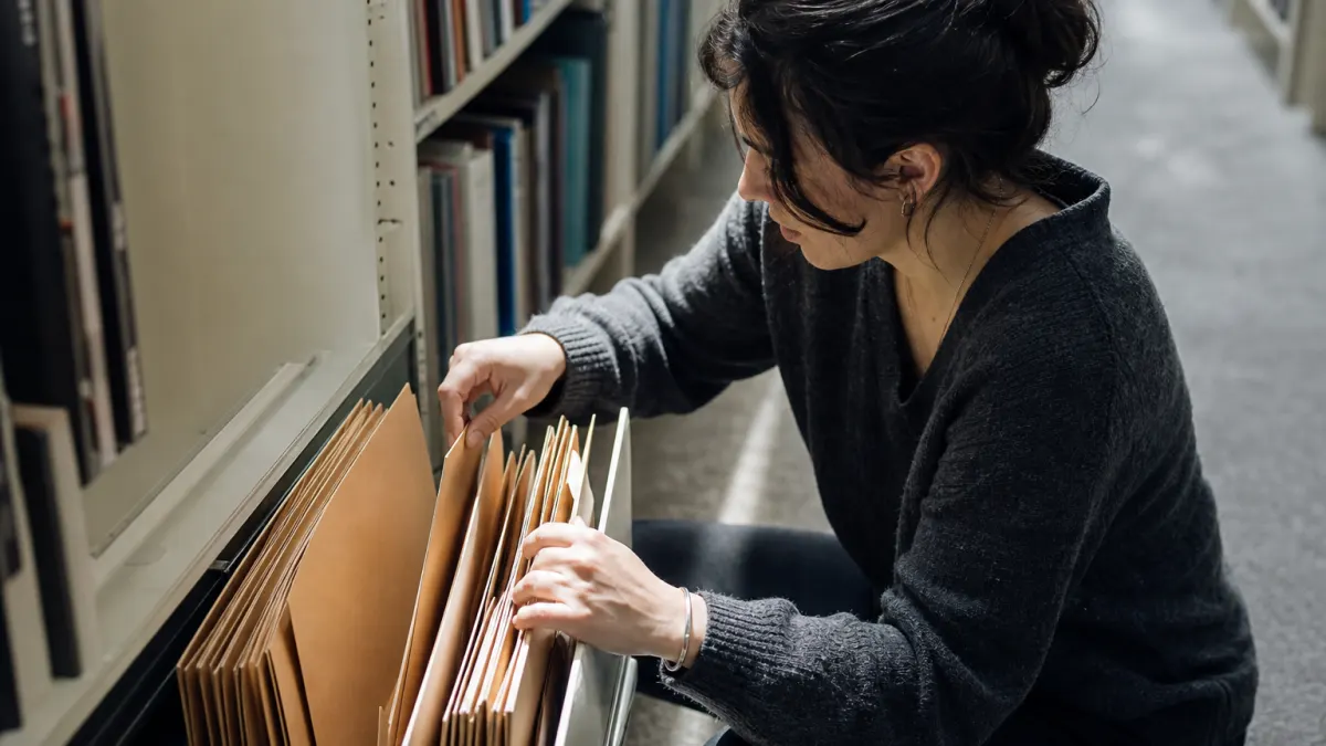 Graduate student sorts folders to choose a paste to Markdown converter path.