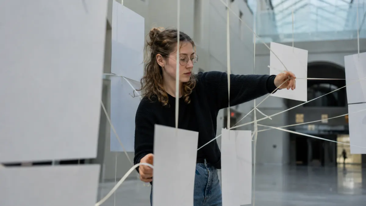 Researcher untangles a webpage to markdown capture problem using blank hanging panels.